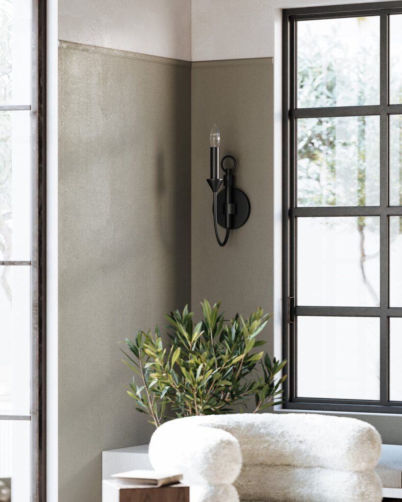 Troy Cate Forged Iron wall sconce beside a window in a living room
